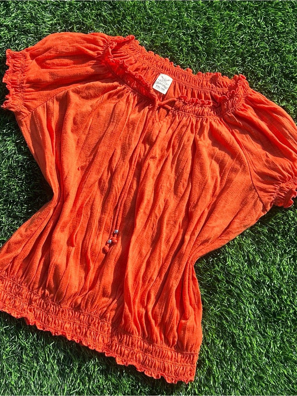 Y2K inspired orange cinch puff sleeve
